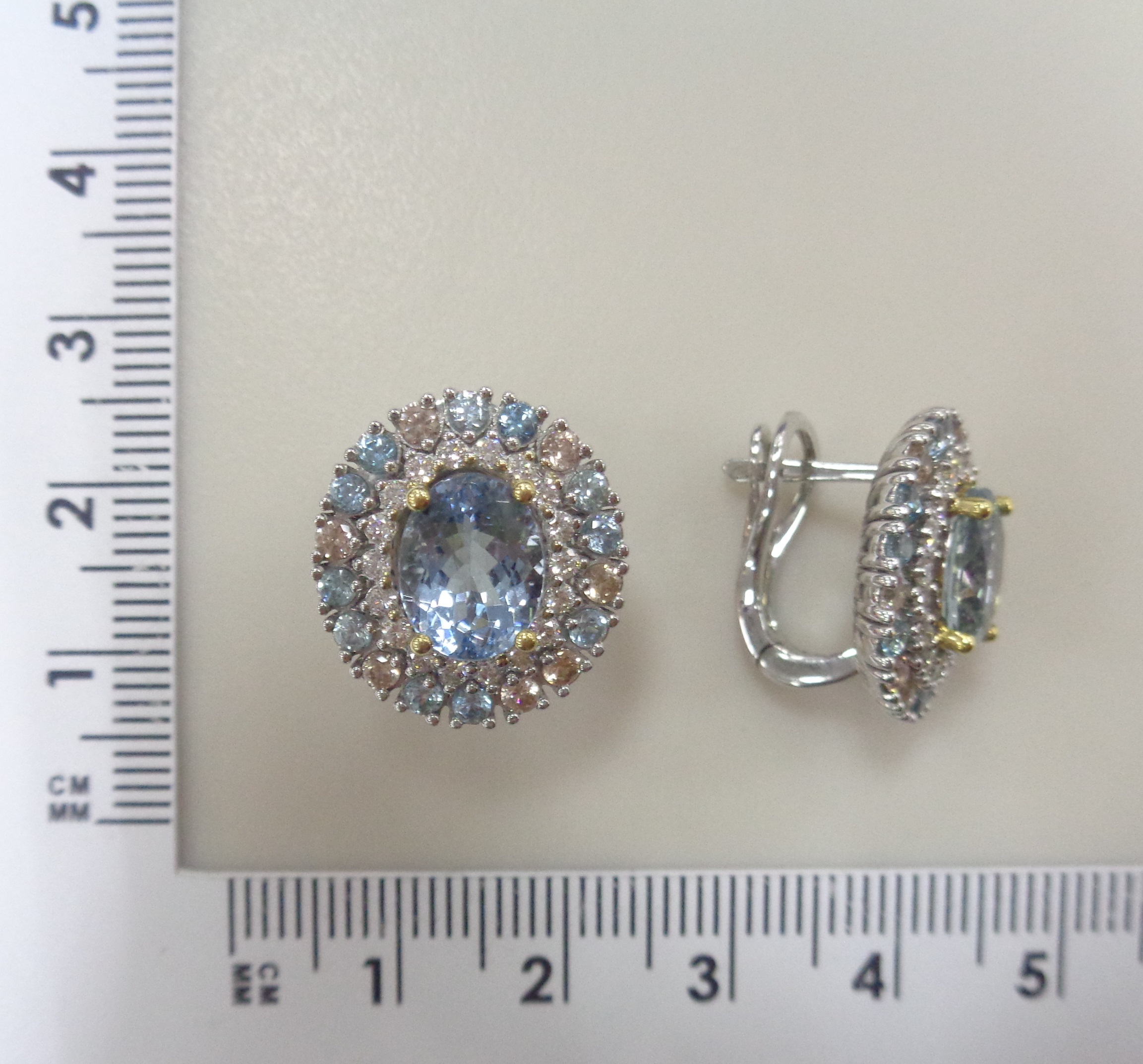 Серьги из комбинированного золота с аквамаринами